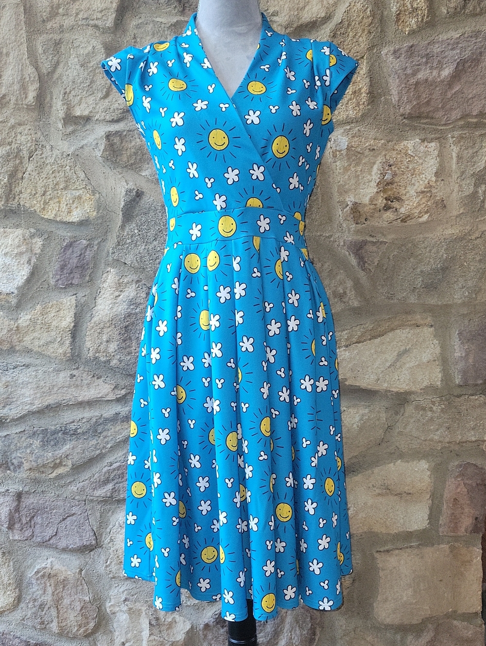 Lady Vintage London Eva dress in happy sun and clouds print